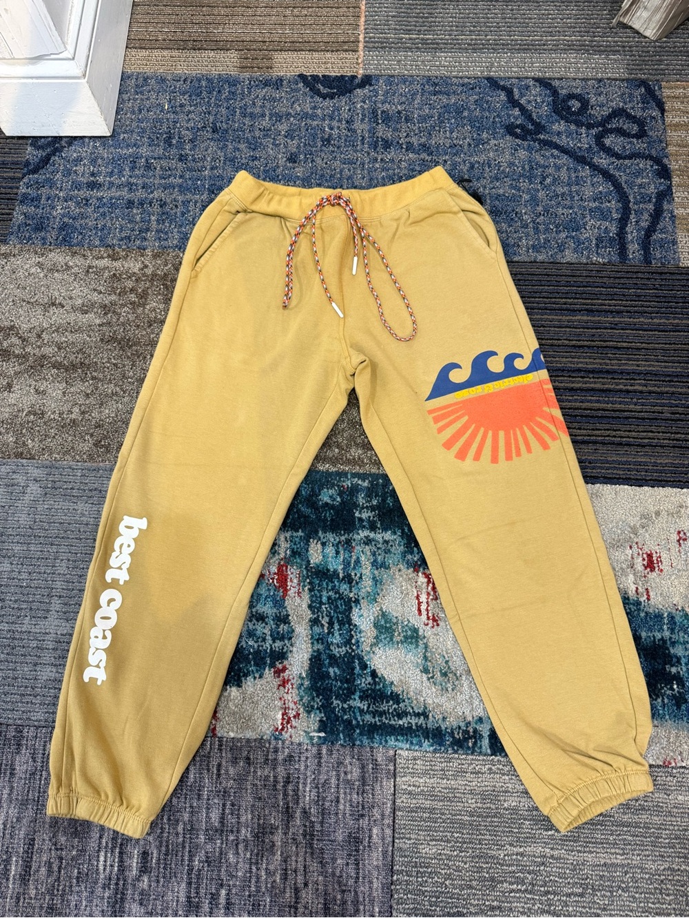 Electric & Rose Mustard Track Joggers with Wave & Sun Graphic